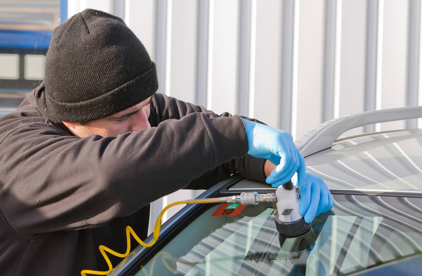 Windscreen Replacement Brisbane Technician performing a windscreen repair